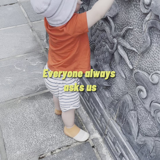 Orange and white mesh shoes in Vietnam