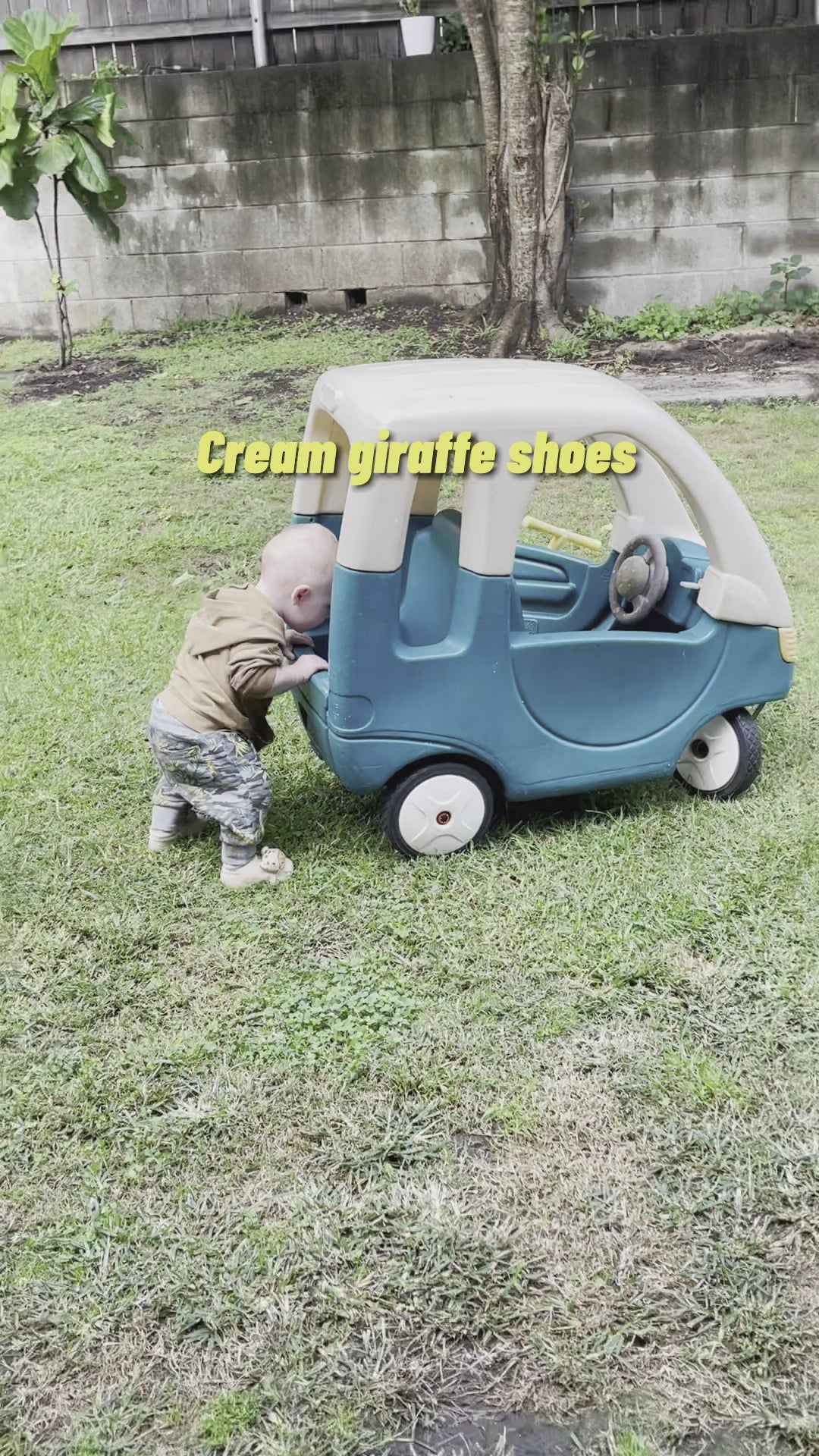 Playing in the garden with cream giraffe shoes